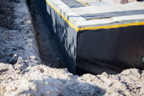 Professional Basement Waterproofing technician working in Sheridan, IN